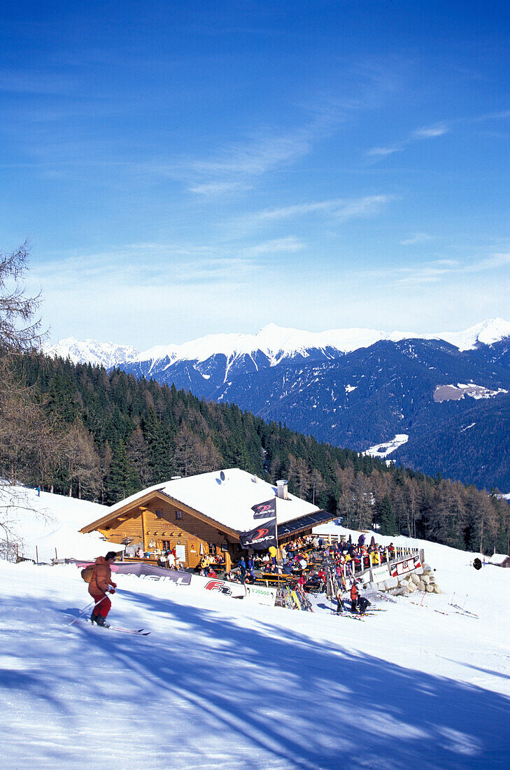 View of ski hut at snowy mountain side, Olang, Kronplatz, Plan de Corones, Dolomites, South Tyrol, Italy, Europe