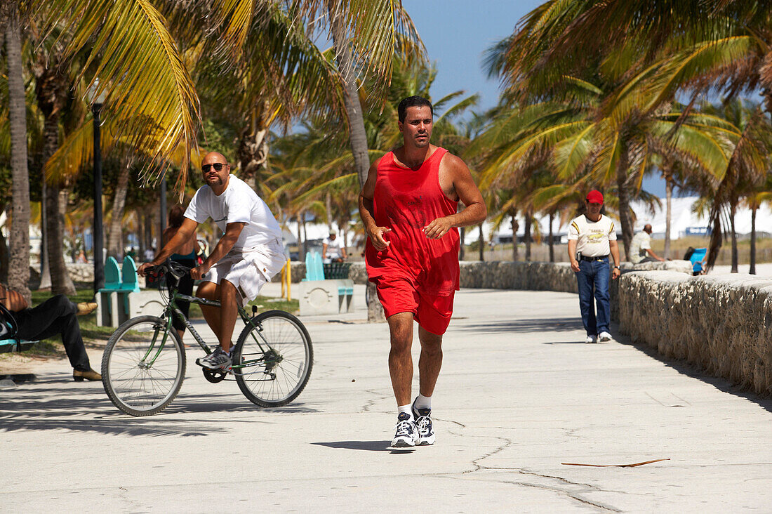 Jogger at the promenade of South Beach, Miami, Florida USA, America
