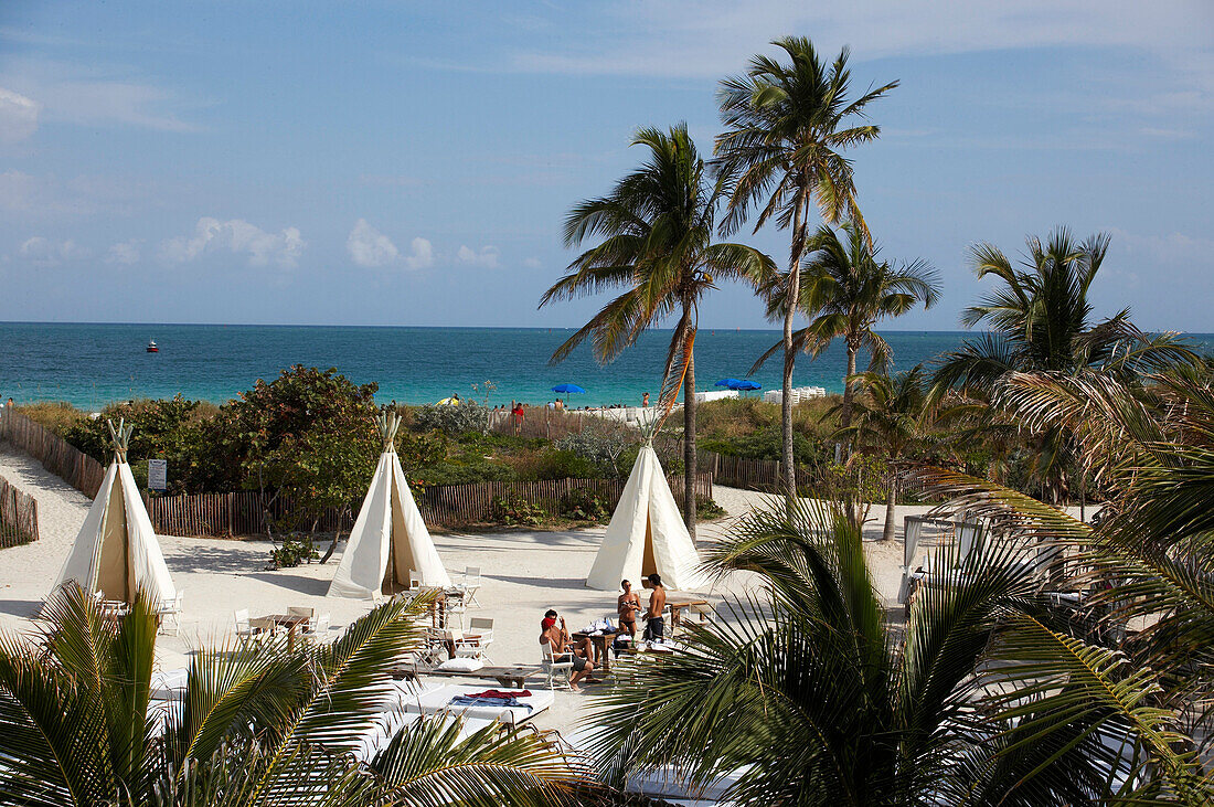 Area at Nikki Beach Club with a beach bar, South Beach, Miami Florida, USA