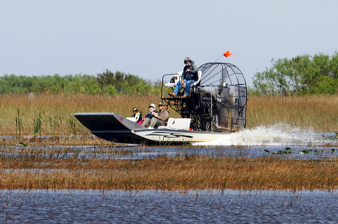 Tourists are making an Airboat Trip, Everglades, Florida USA