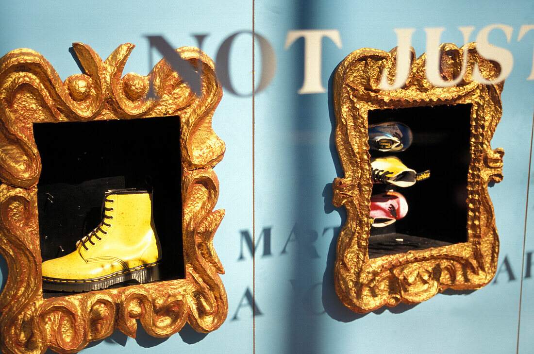 Yellow shoe in shop display, Carnaby Street, London, England, United Kingdom