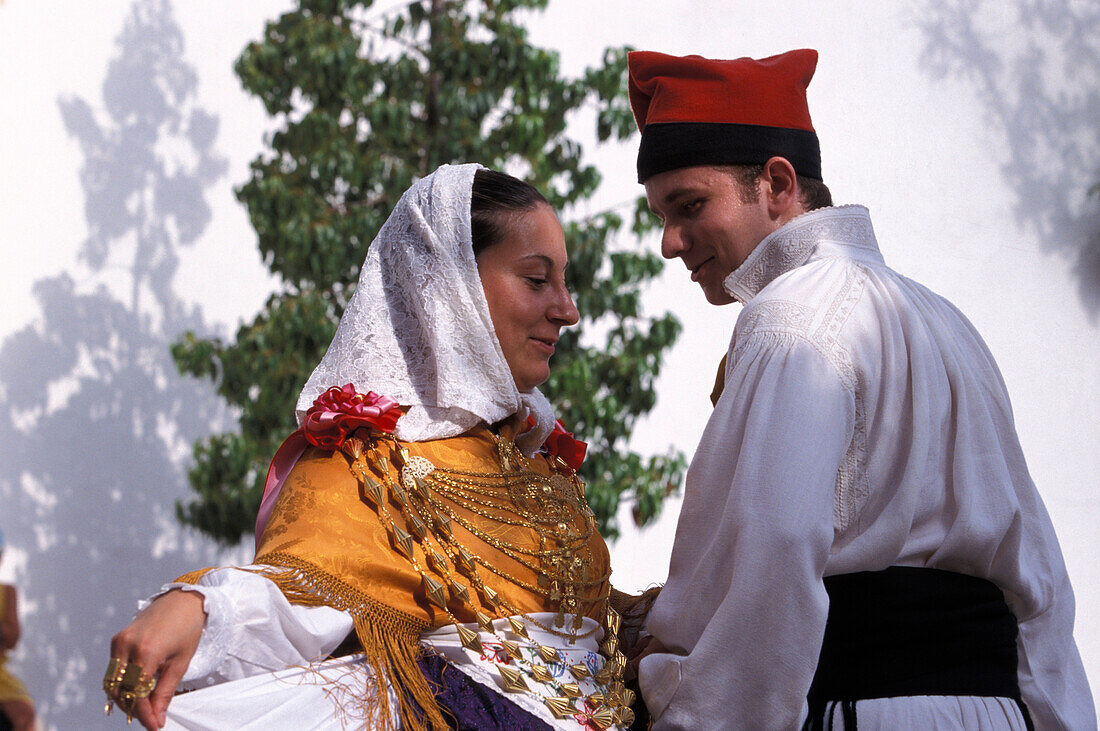 Couple wearing traditional clothes dancing, Folklore, San Miquel, Ibiza, Spain