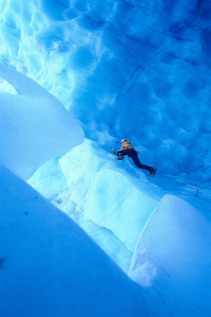 Ice climber on steep climb, Pitztaler Glacier, Austria