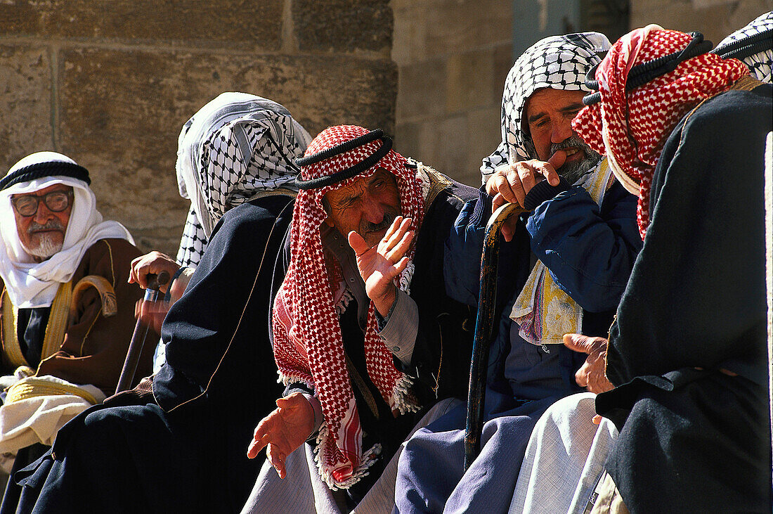 Arabic men in conversation at the Dome of the Rock, Jerusalem, Israel