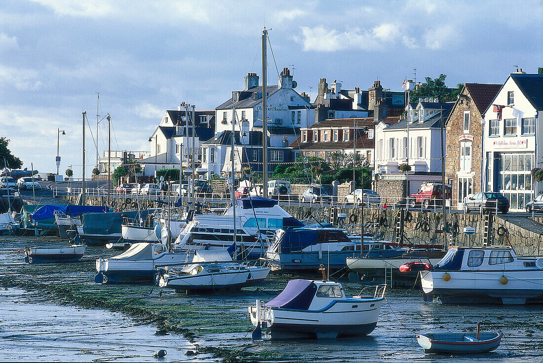 Harbour at low tide in the morning light, St. Aubins, Jersey, Channel Islands, Great Britain