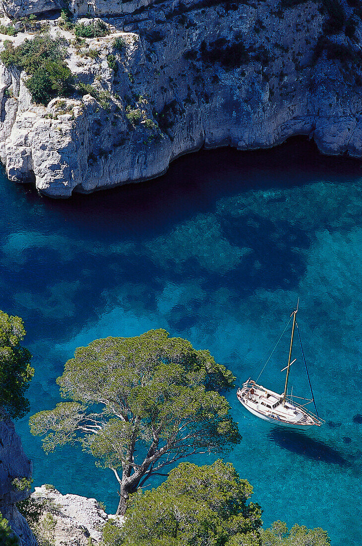 High angle view at a boat in a bay, Calanque d´En-Vau, Cote d´Azur, Bouches-du-Rhone, Provence, France, Europe
