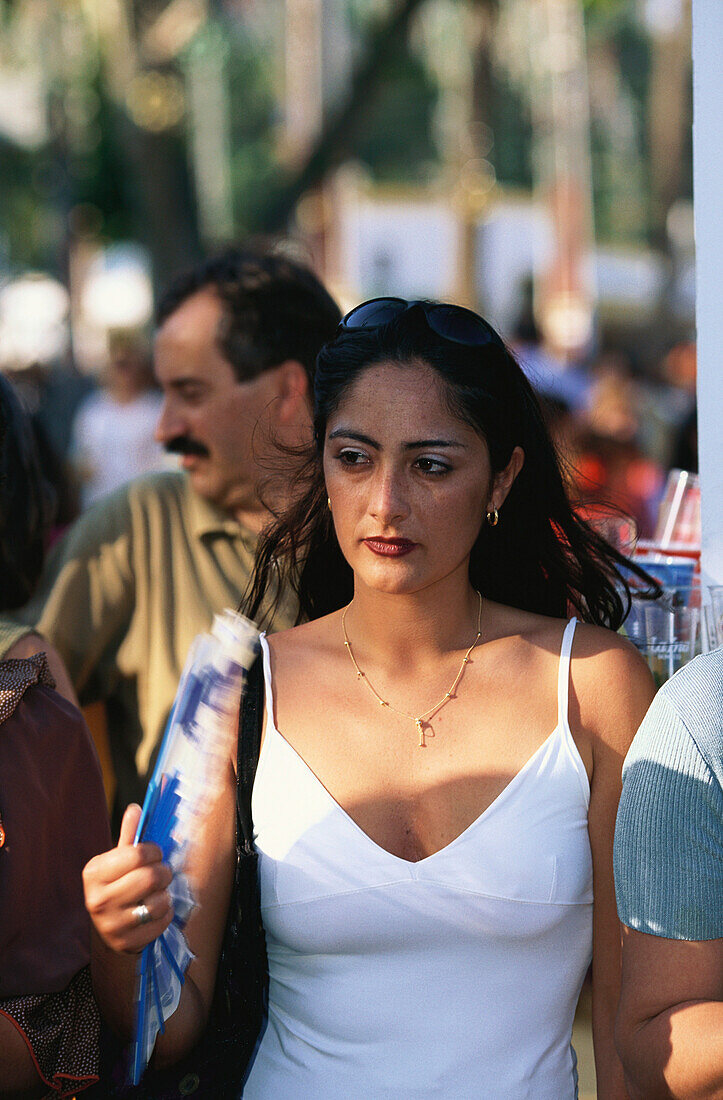 Young woman wearing a dress at Feria del Caballo, Jerez de la Frontera, Cadiz, Andalusia, Spain, Europe