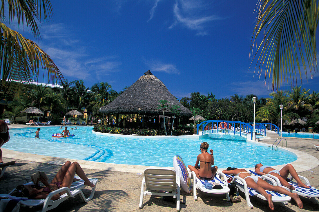 People at the pool of Sol Palmeiras hotel, Varadero, Cuba, Caribbean, America