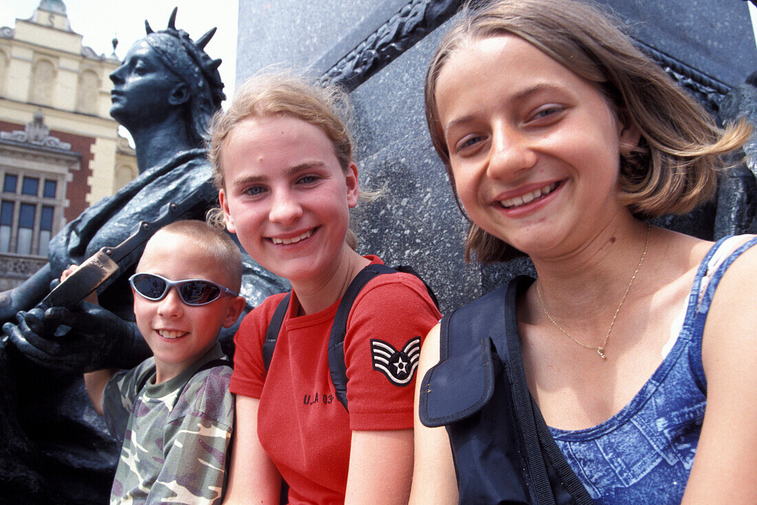 Pupils, Central Statue, Market Square, Cracow Poland