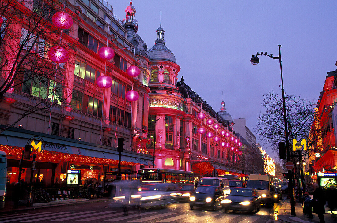 The illuminated Printemps department store in the evening, Paris, France, Europe