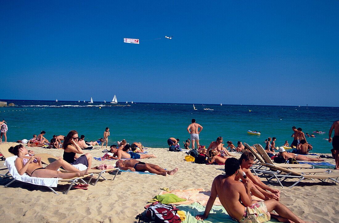 Beach Platja Barceloneta, Airplane Promotion, Beach Platja Barceloneta in Barcelona, Catalonia, Spain