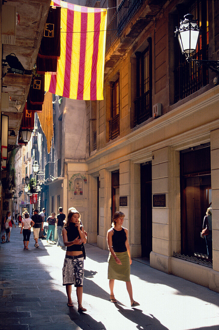 Narrow street in Barri Gotic, Old City of Barcelona, Catalonia, Spain