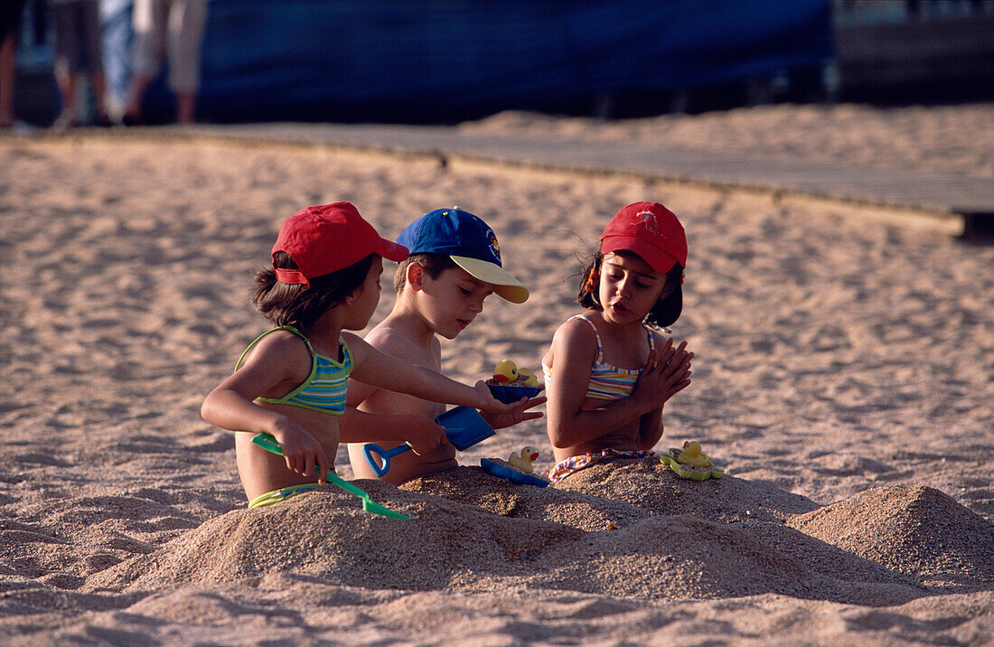 Children Sand Beach Costa Brava, Children on the beach at Platja Gran, Tossa de Mar, Costa Brava, Catalonia, Spain
