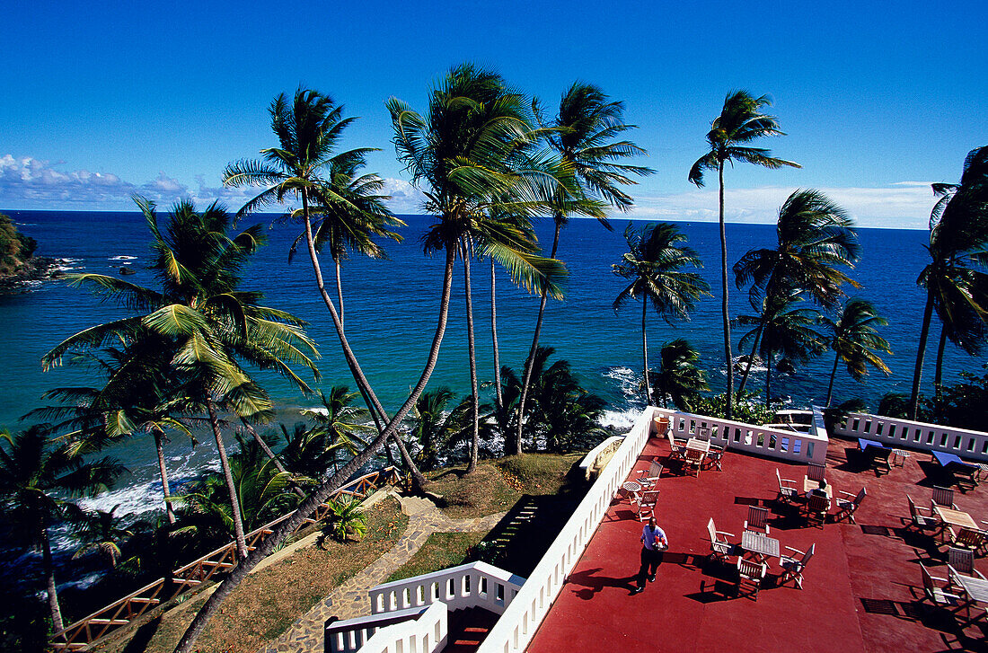 Terrace against ocean, Blue Haven Hotel Scarborough, Trinidad and Tobago, Caribbean