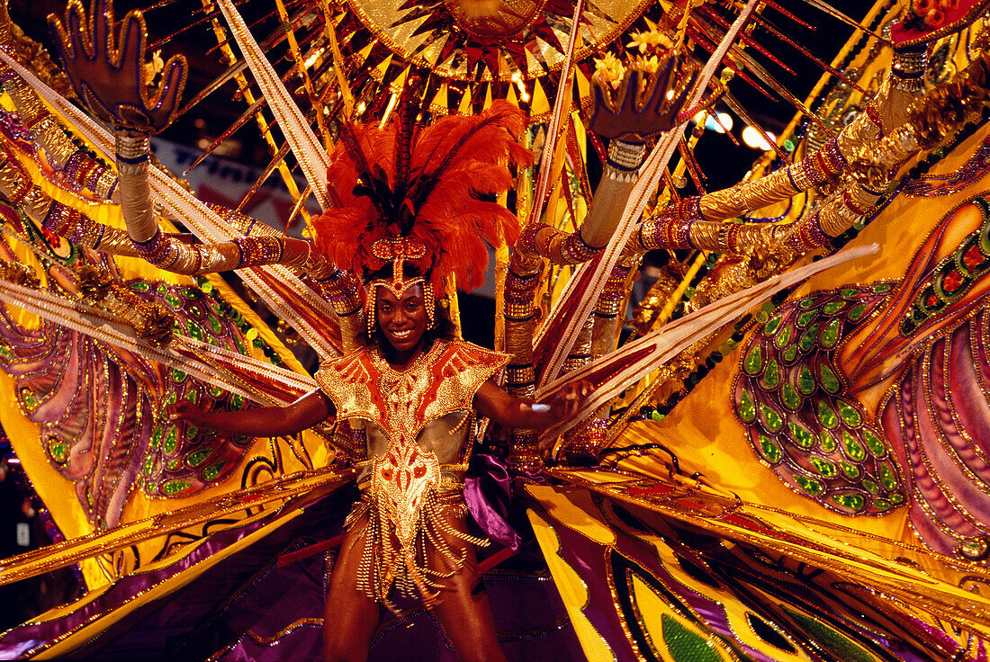 Woman in carneval costume dancing at Mardi Gras, Carnival, Port of Spain, Trinidad and Tobago
