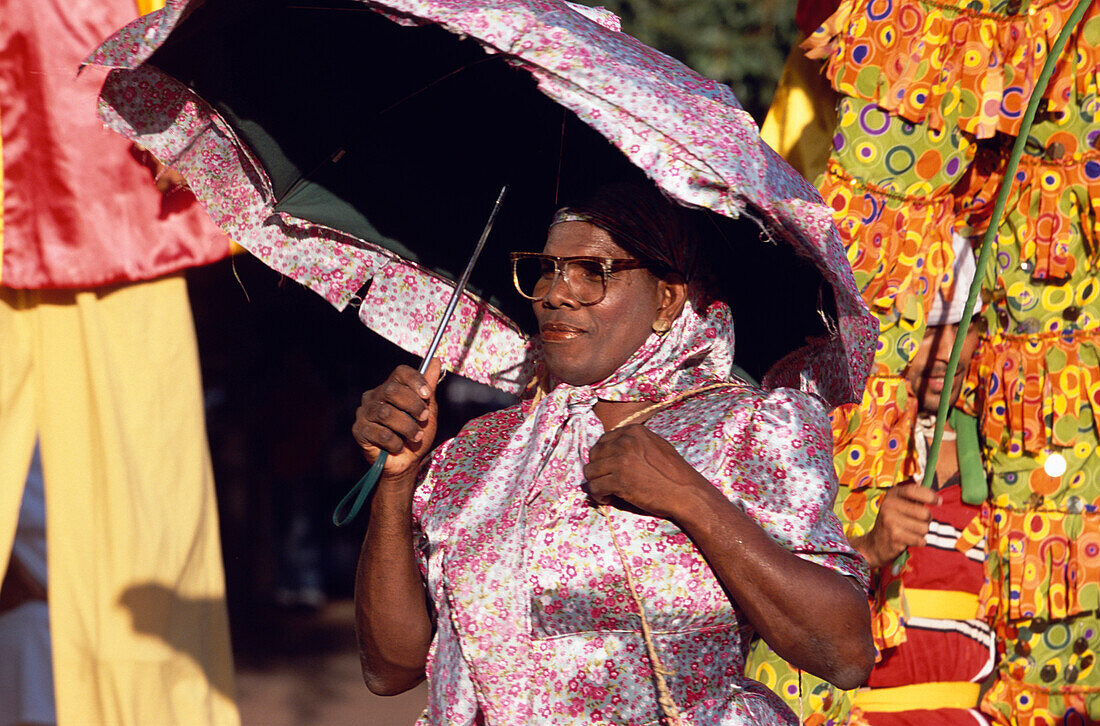 Woman, Costume, Umbrella, Woman in carnival costumes with an umbrella in Santo Domingo, Dominican Republic