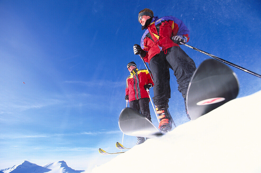 Skier, Two skiers on mountain top, Siala, Laax, Grisons, Switzerland