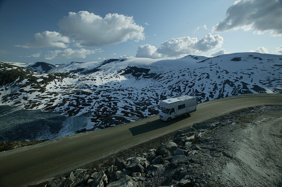 Camper Car on Road to Dalsnibba, More og Romsdal, asgainst Jostedalsbreen, Norway