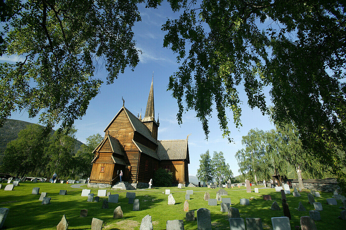 Stave church with gravestones, Stavkirka Lom, Oppland, Norway