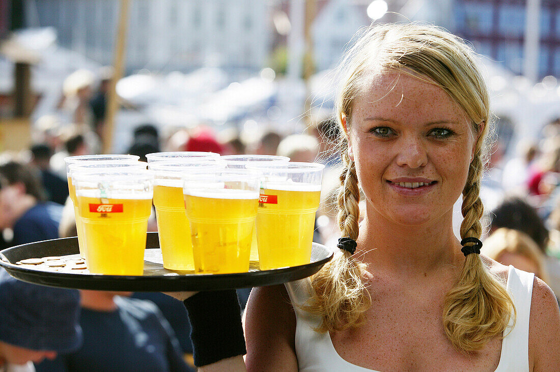 Waitress with tablet of beer, Skagen, Stavanger, Rogaland, Norway