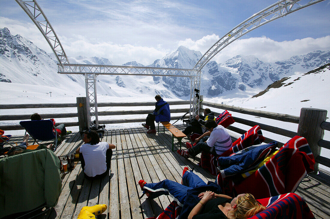 Skier on a break Madritschhütte, Sulden, South Tyrol, Italy