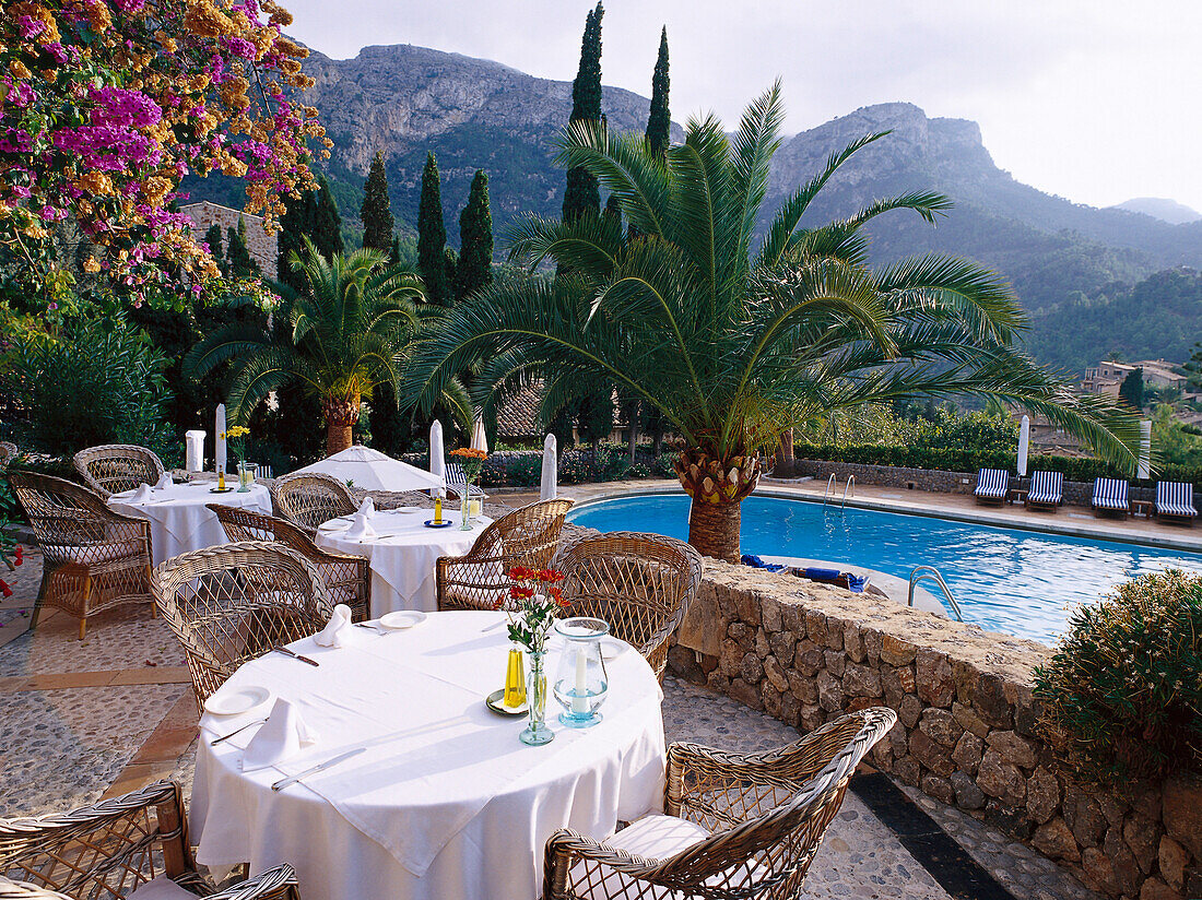 Terrace and swimming pool in Hotel La Residencia, Deyá, Majorca, Spain