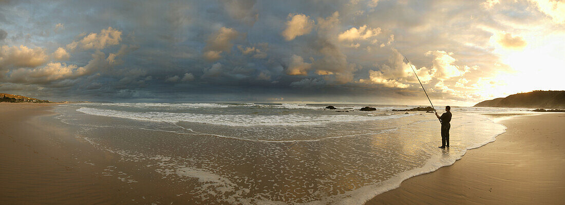 Fishing man on the beach, Western Cape, South Africa