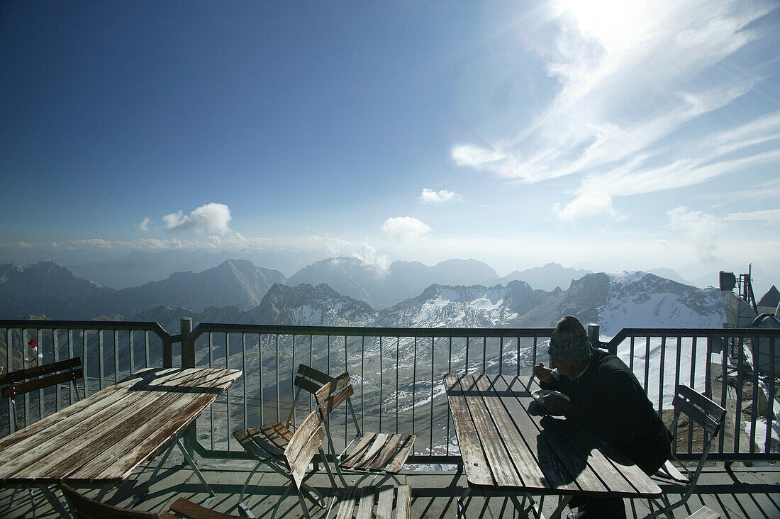 Lunching in refuge on mountain top, Zugspitze, Bavaria, Germany