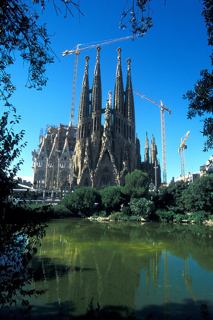 View over a lake at the basilica Sagrada Familia, Barcelona, Spain, Europe
