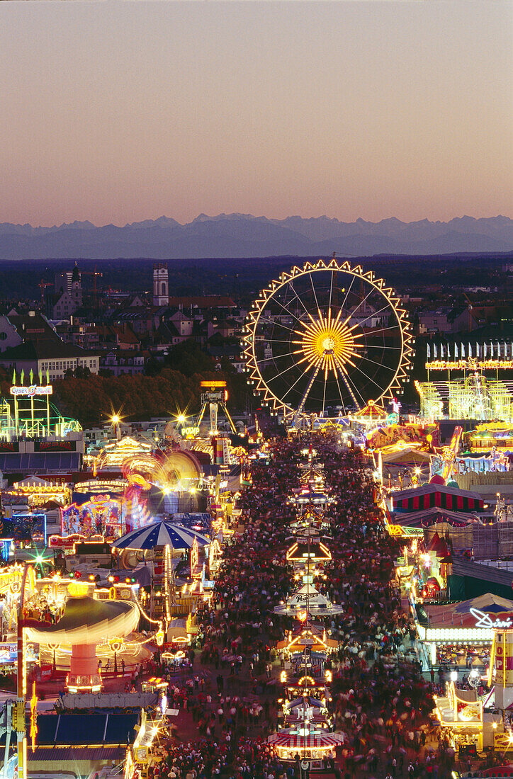 View on Oktoberfest site and Munich panorama at night, Bavaria, Germany