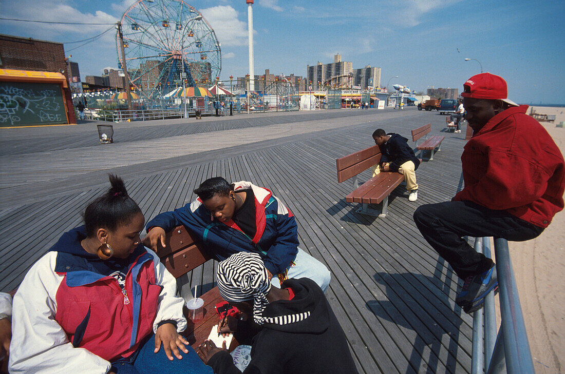 Youths at an amusement park on Coney Island, New York City, New York, USA