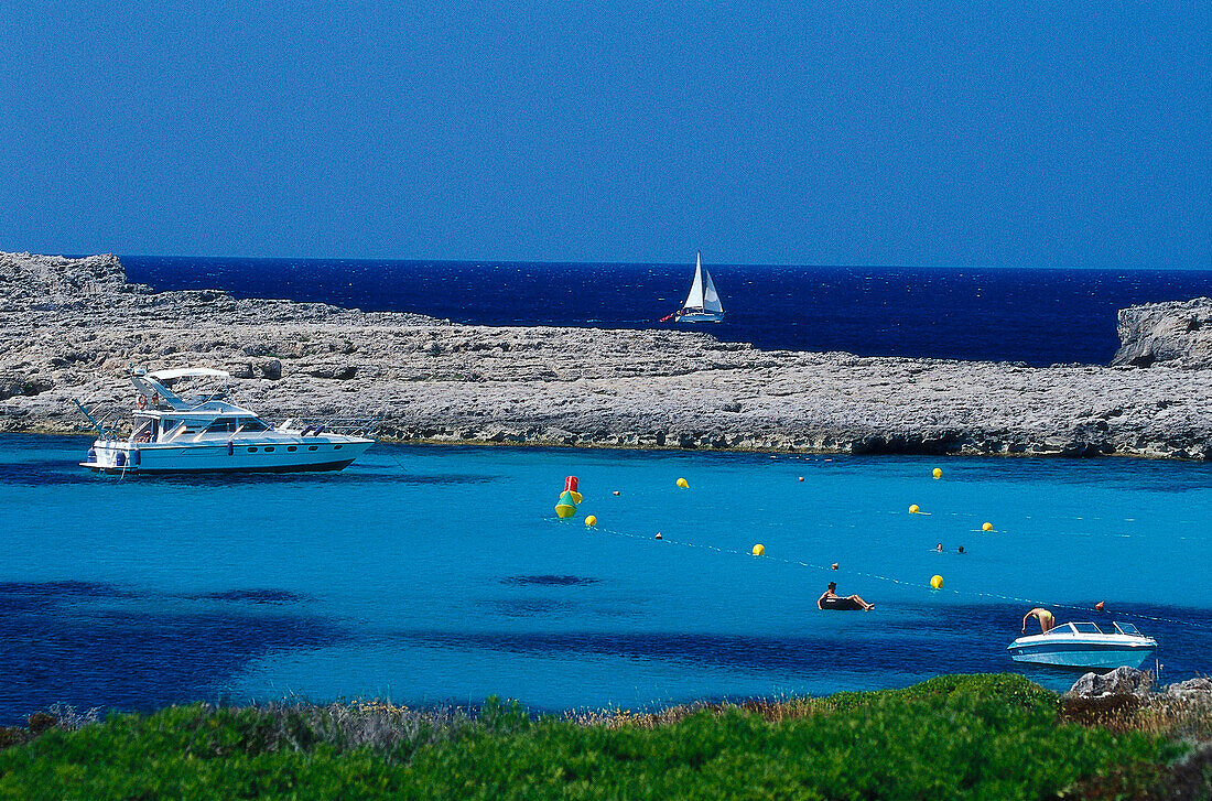 Boats in a bay at Cala Binibeca, Minorca, Spain