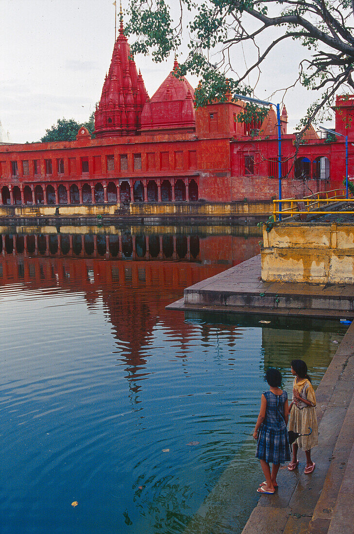 People and water basin in front of Durga temple, Varanasi, Benares, Uttar Pradesh, India, Asia