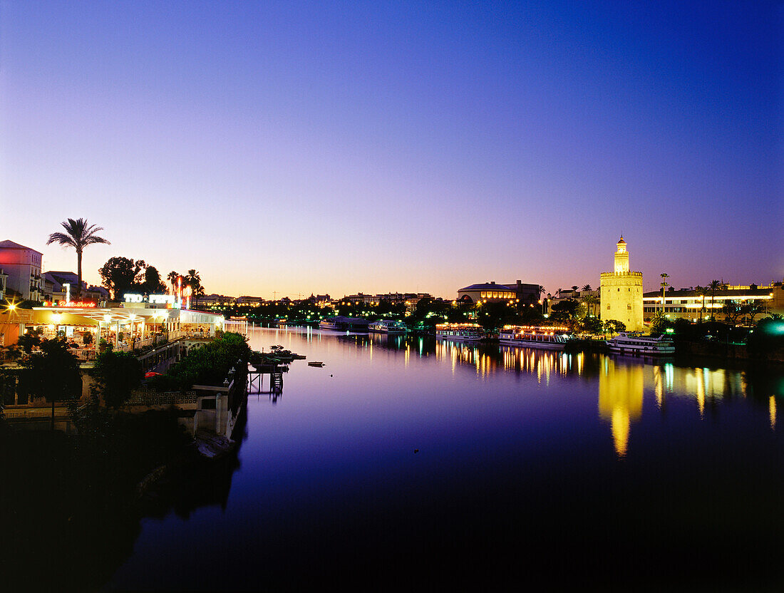 Townscape with Torre del Oro, Moorish watchtower at the ancient river port, Restaurant Rio Grande, Guadalquivir River, Sevilla, Seville, Andalusia, Spain