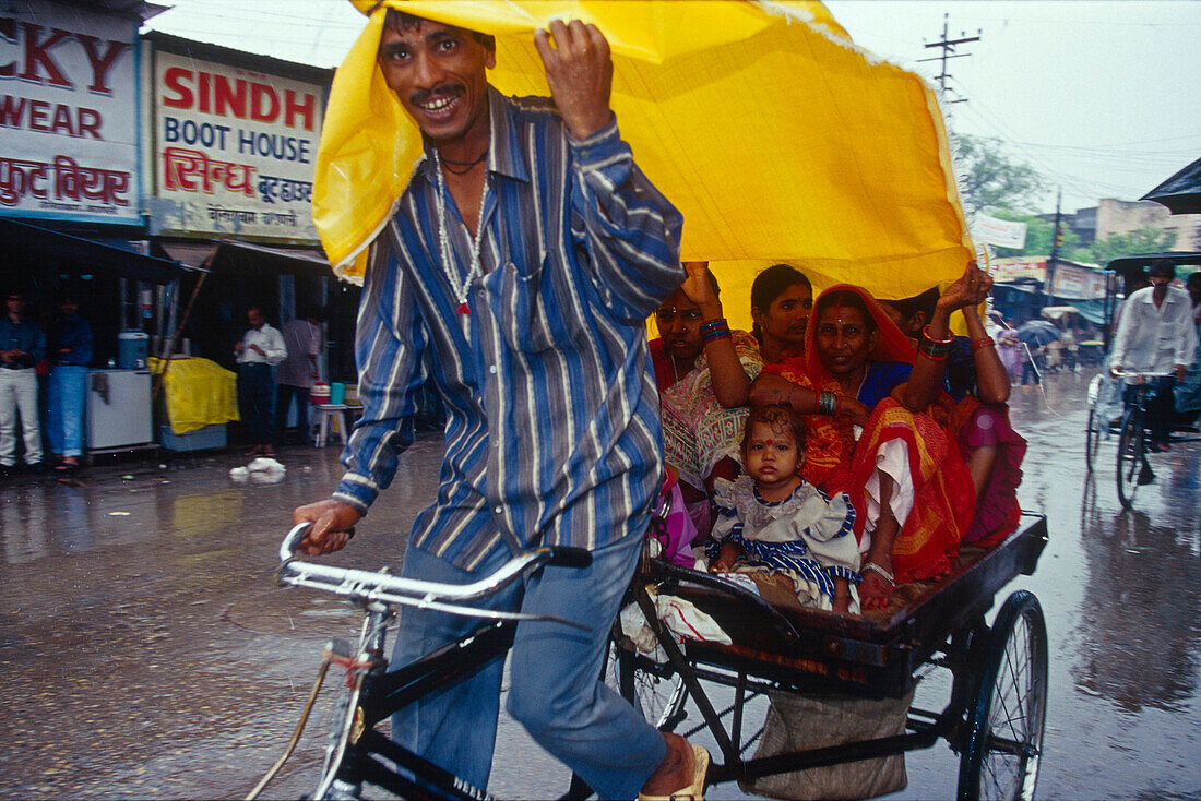 Rickshaw, plastic tarpaulin, monsoon , Varanasi, Benares, Uttar Pradesh, India