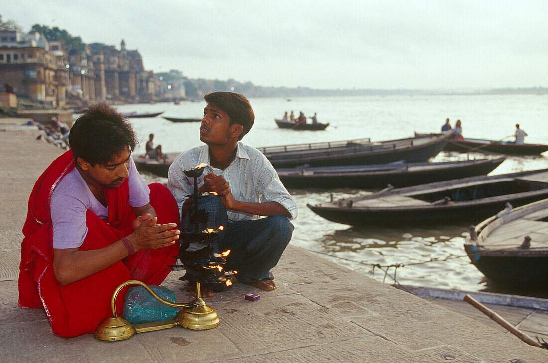 Priest , sunrise pray, Ganges river-, Varanasi, Benares Uttar Pradesh, India