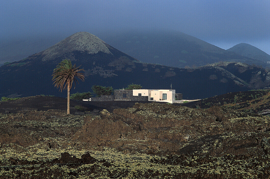 House in volcanic landscape, Montanas del Fuego, Lanzarote Canary Isl., Spain