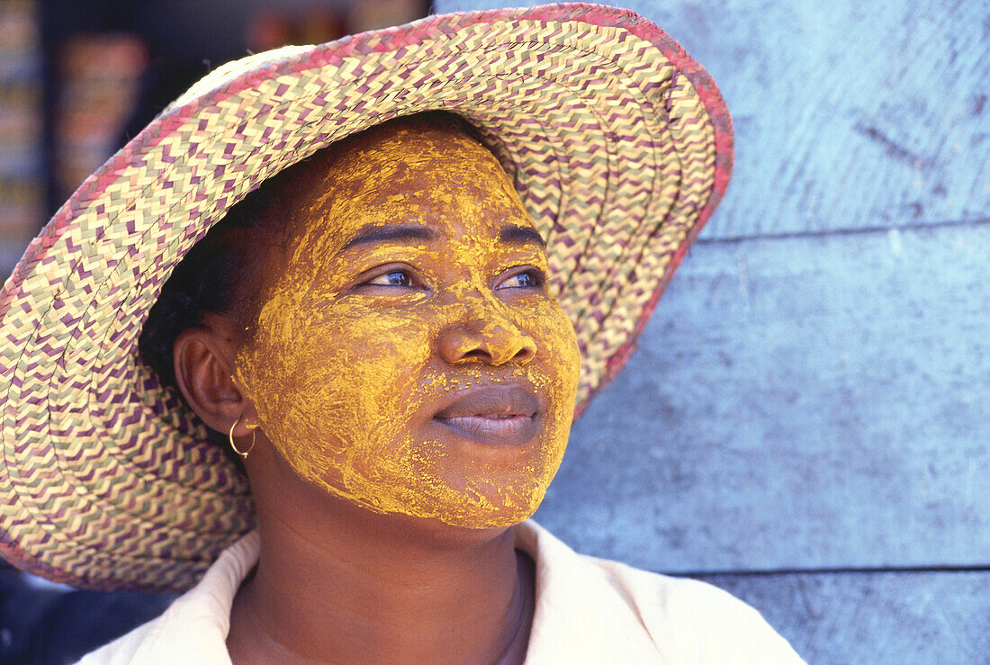 Vezo woman with painted face, face mask, Morondava, Madagascar