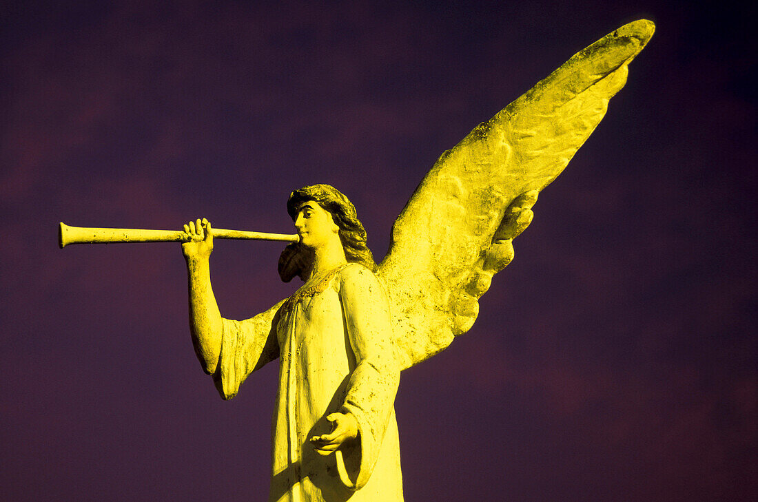 Illuminated angel statue in front of church, Sarchi, Costa Rica, Central America, America