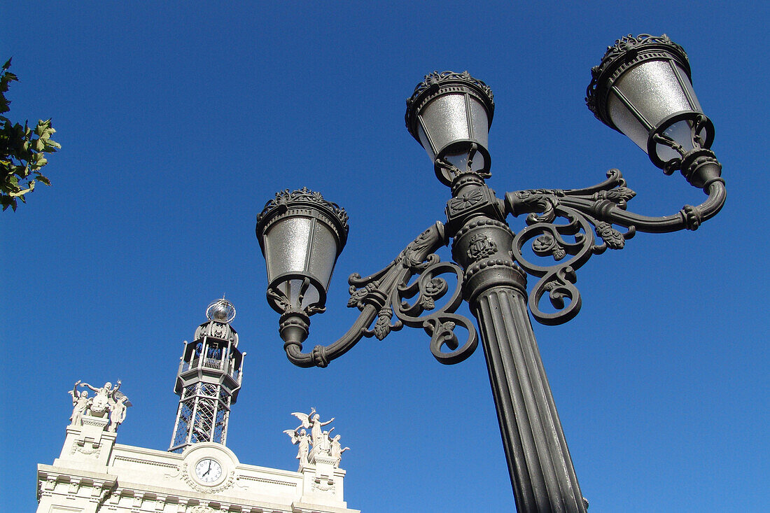 Street lamp and historical building under blue sky, Valencia, Spain, Europe