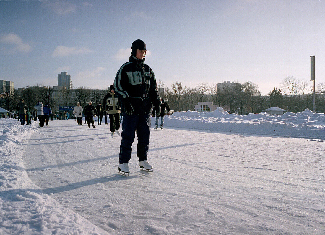 Boy ice skating in Gorki Park, Moscow, Russia