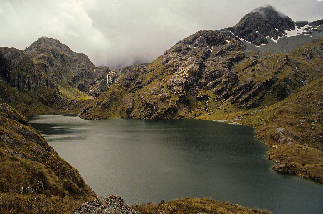 Lake Harris, Routeburn Track, crossing Harris Saddle on Routeburn Track, walking track in Mount Aspiring and Fiordland National Park, one of New Zealand's Great Walks