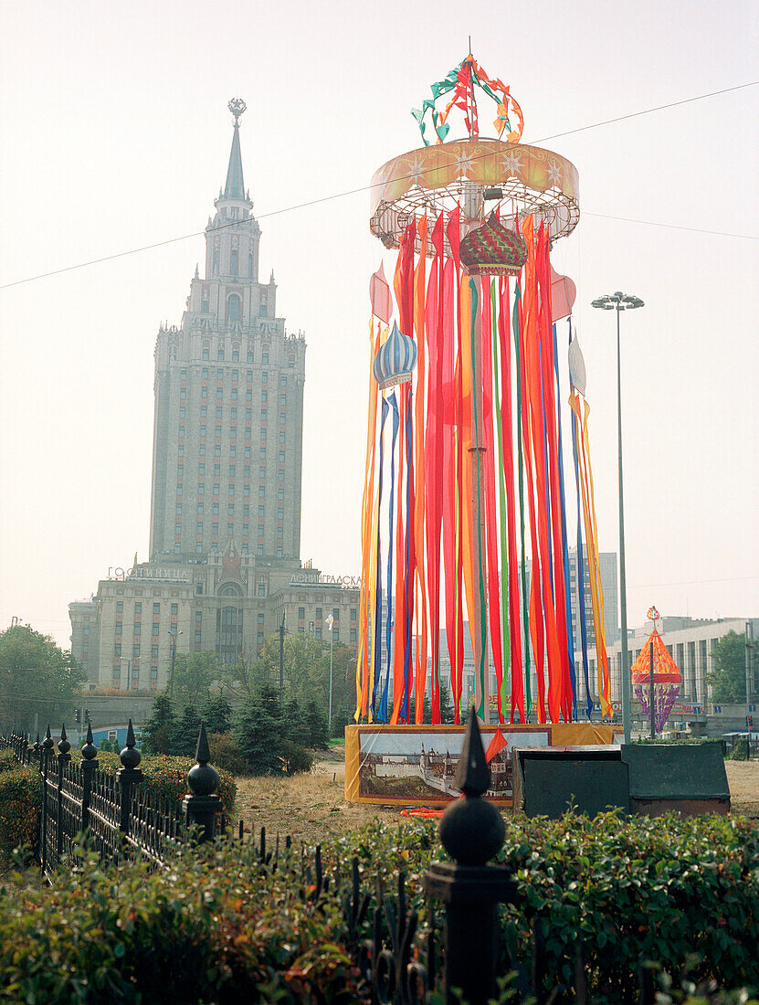 Colourful banners in front of the Leningradskaya Hotel, Komsomol Square, Moscow, Russia