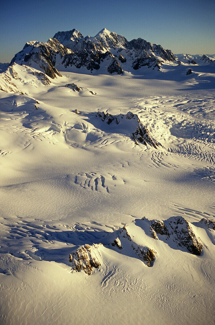 Aerial view of Southern Alps, snowfields above Fox and Franz Joseph glacier, Westland National Park, South Island, New Zealand, Oceania