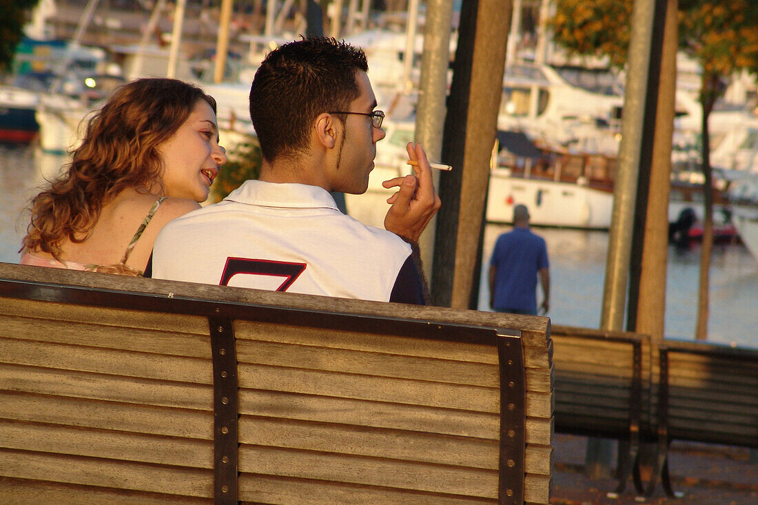 Young couple, port vell, barcelona, spain