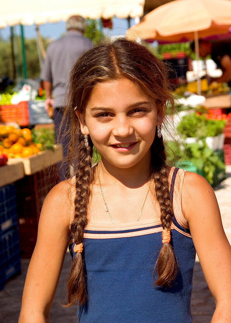 Girl on vegetable market, Peloponnes Greece