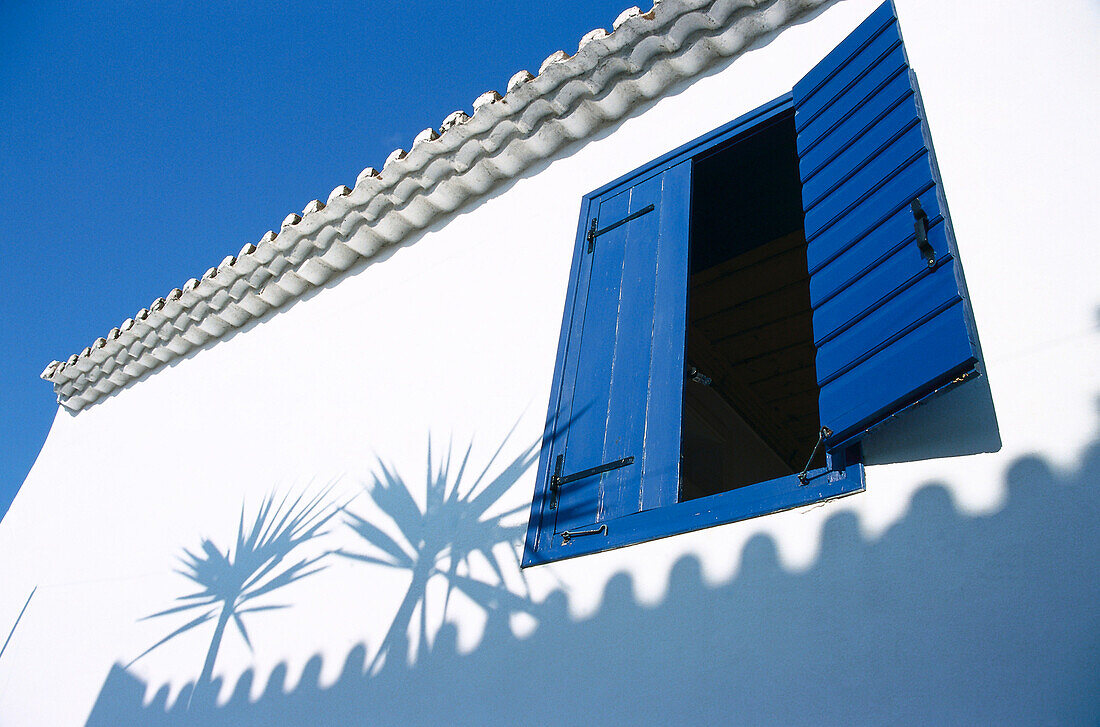 Window and shadows on the wall of a house, Koroni, Messinia, Peloponnese, Greece