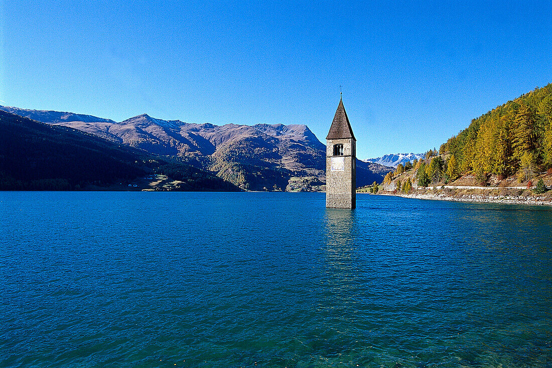 Immersed steeple at lake Reschensee, South Tyrol, Italy, Europe