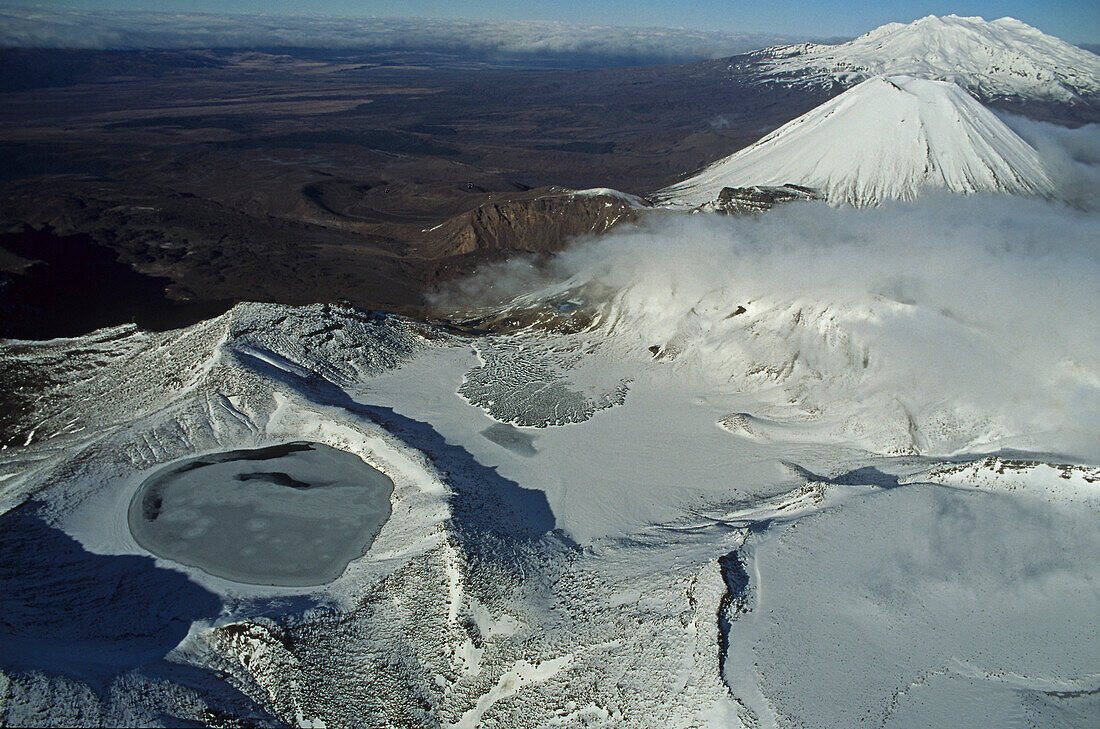 Aerial view of the snow covered volcanos Mount Ruapehu and Mount Ngauruhoe, Tongariro National Park, North Island, New Zealand, Oceania