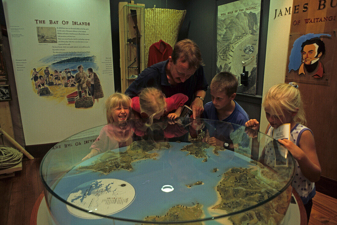 Waitangi, near Paihia, Family inside Waitangi museum, Bay of Islands